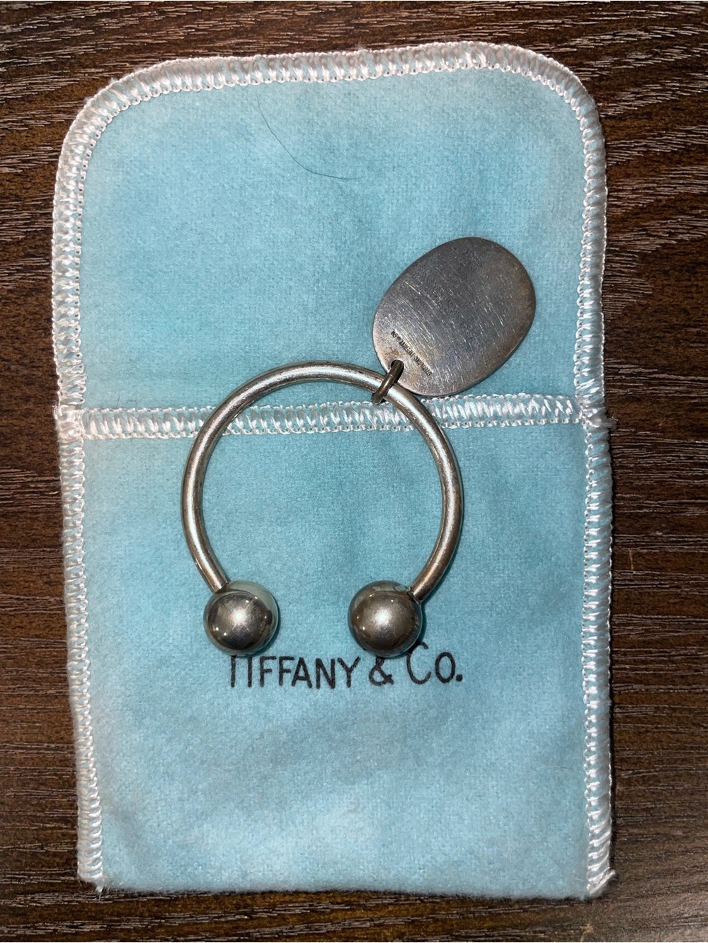 Tiffany & Co. 2001 Return to Tiffany Round Tag Screwball Key Ring -925
Sterling